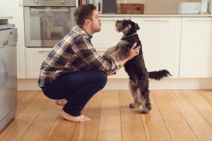 man talking to his dog
